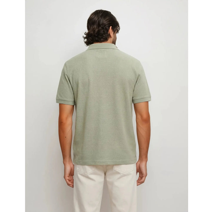 Parte trasera polo verde hombre algodón corte regular EE Exclusive